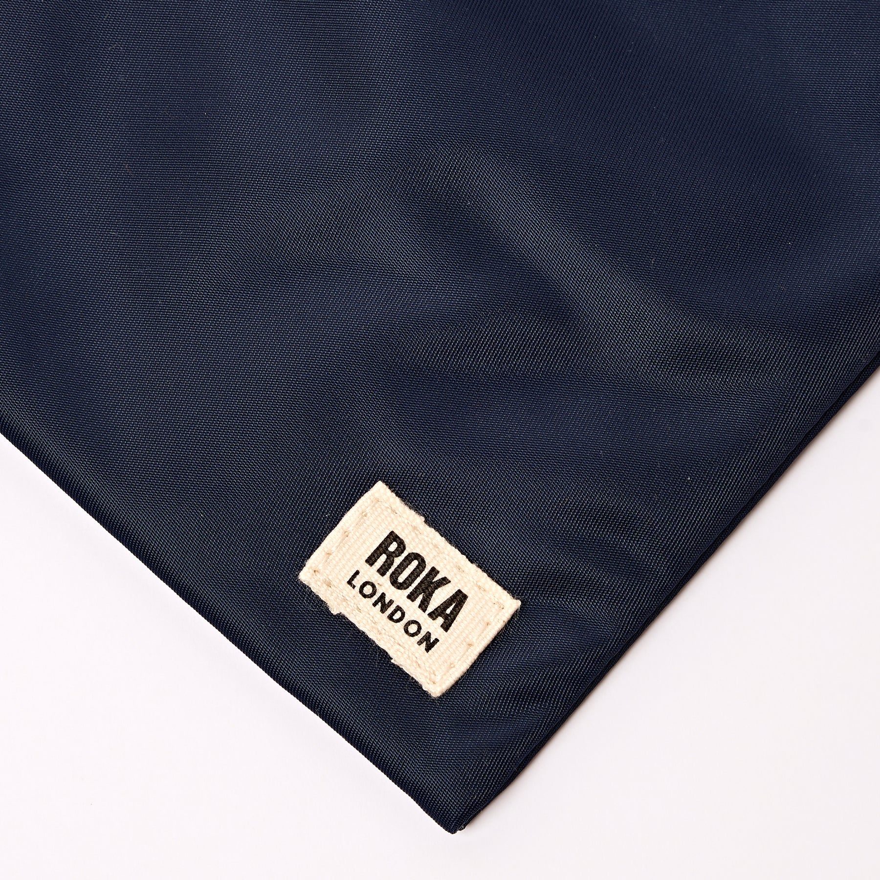 ROKA Chelsea Sling Bag in Midnight Stripe Nylon